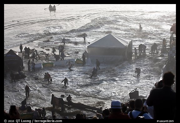 Tidal wave washing booth during mavericks contest. Half Moon Bay, California, USA (color)