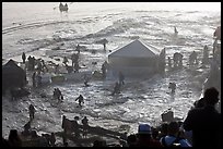 Tidal wave washing booth during mavericks contest. Half Moon Bay, California, USA (color)