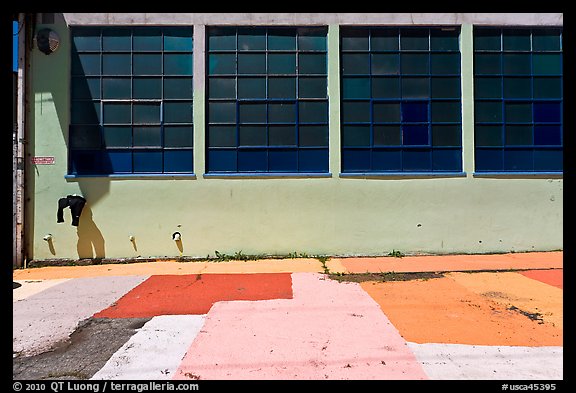Industrial building and painted sidewalk. Berkeley, California, USA