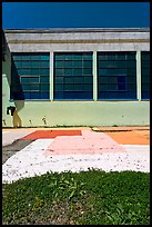 Sidewalk and industrial building facade. Berkeley, California, USA