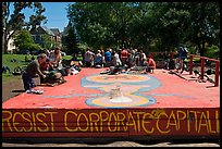 People gathered behind podium, Peoples Park. Berkeley, California, USA