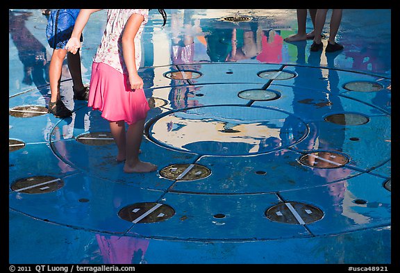 Reflections of children playing in fountain, Gilroy Gardens. California, USA