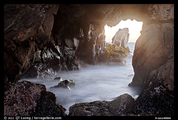 Looking through Pfeiffer Beach arch. Big Sur, California, USA