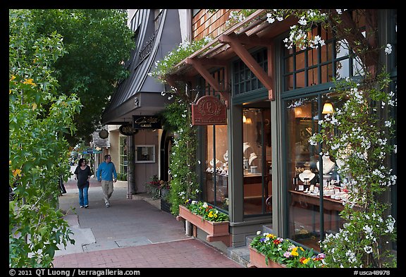 Sidewalk and stores on Ocean Avenue. Carmel-by-the-Sea, California, USA (color)