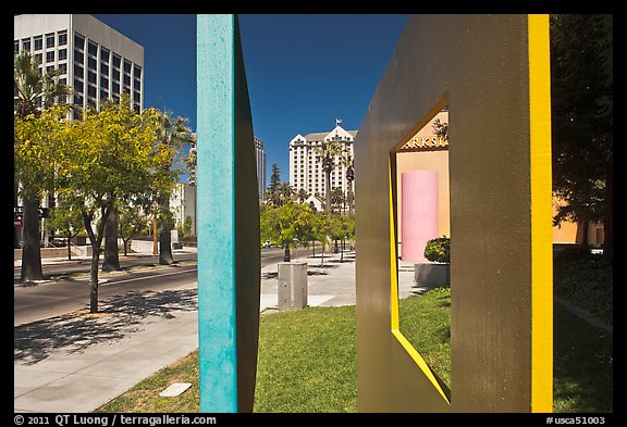 Downtown San Jose seen through colorful modern sculpture. San Jose, California, USA (color)