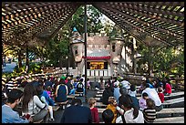 Families watch puppet performance, Happy Hollow Park. San Jose, California, USA
