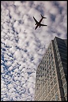 Adobe Tower and commercial aircraft. San Jose, California, USA (color)