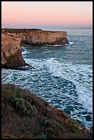 Wave and sea  cliffs at sunset, Wilder Ranch State Park. California, USA