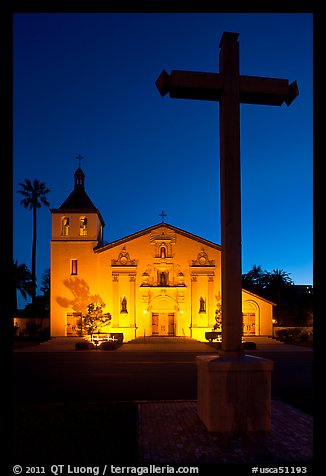 Cross and Santa Clara Mission at dusk. Santa Clara,  California, USA