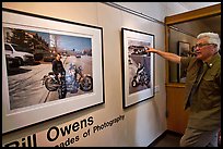 Bill Owens commenting on his photographs, PhotoCentral gallery, Hayward. California, USA