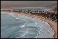 Surf, beach and town from above. California, USA (color)