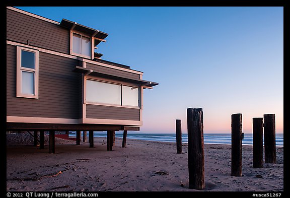 Pilings and beach house at sunset, Stinson Beach. California, USA