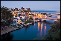 Bridges over Soquel Creek and village at dusk. Capitola, California, USA