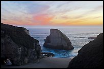 Offshore rock at sunset, Davenport. California, USA (color)