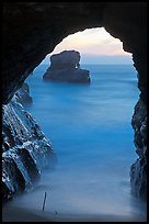Ocean seen from sea arch at sunset, Davenport. California, USA ( color)
