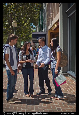 Group talking on University Avenue. Palo Alto,  California, USA