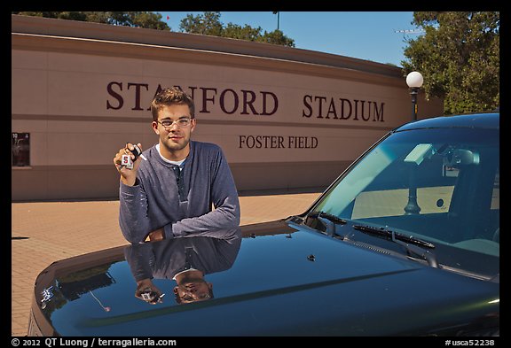 Student showing car keys. Stanford University, California, USA (color)