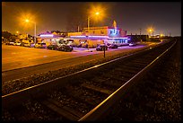 Railroad tracks and restaurant at night, Alviso. San Jose, California, USA (color)