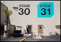 Man entering soundstage, Paramount Pictures Studios lot. Hollywood, Los Angeles, California, USA (color)