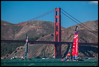 USA and New Zealand America's cup boats and Golden Gate Bridge. San Francisco, California, USA (color)