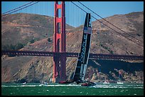 Oracle Team USA defender America's cup boat and Golden Gate Bridge. San Francisco, California, USA (color)