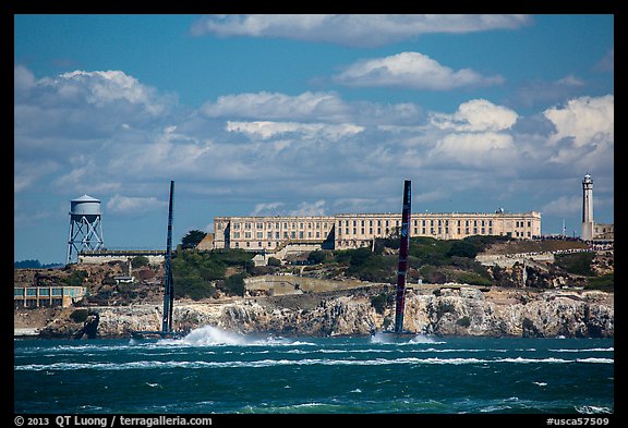 America's cup catamarans in front of Alcatraz Island. San Francisco, California, USA (color)