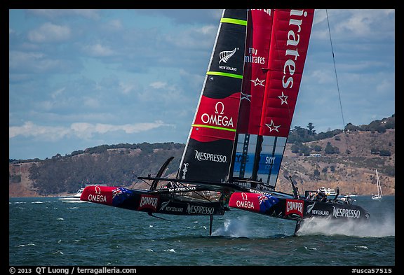 Emirates Team New Zealand Aotearoa catamaran foiling in upwind leg. San Francisco, California, USA (color)