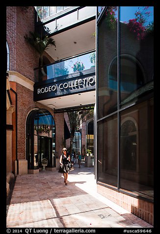 Woman walks in Rodeo Collection shopping area. Beverly Hills, Los Angeles, California, USA (color)