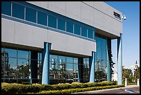 Oil refinery reflected in windows of office building, Manhattan Beach. Los Angeles, California, USA ( color)