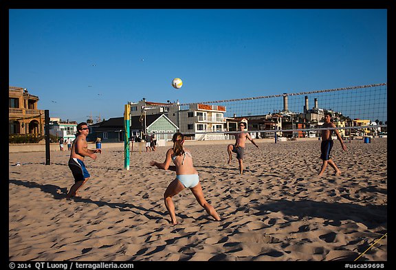 People playing volleyball on beach, Hermosa Beach. Los Angeles, California, USA (color)
