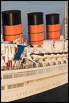 Queen Mary side and smokestacks at sunrise. Long Beach, Los Angeles, California, USA ( color)