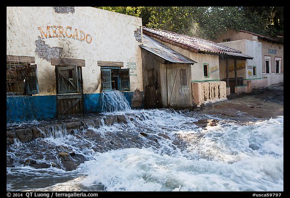 Adobe buildings and artificial flood, Universal Studios. Universal City, Los Angeles, California, USA (color)