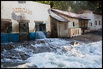 Adobe buildings and artificial flood, Universal Studios. Universal City, Los Angeles, California, USA ( color)