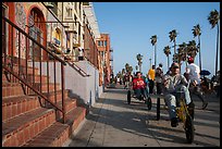 Men riding tricycles on Ocean Front Walk. Venice, Los Angeles, California, USA ( color)