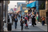 People stroll on Ocean Front Walk. Venice, Los Angeles, California, USA ( color)