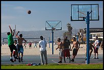 Men playing basketball, Mission Beach. San Diego, California, USA ( color)