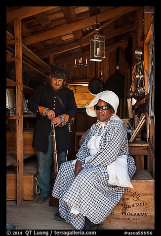 Elderly couple in period costume, Fort Tejon. California, USA (color)