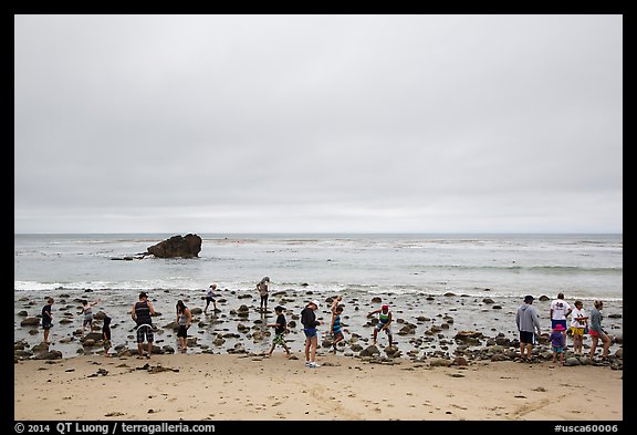 Vistors explore tidepools, Leo Carillo State Beach, Santa Monica Mountains NRA. Los Angeles, California, USA (color)
