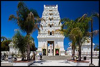 Family walks into Malibu Hindu Temple, Calabasas. Los Angeles, California, USA ( color)