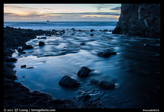 Creek flowing into ocean at dusk. Big Sur, California, USA (color)