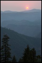 Sun setting over ridges, Stanislaus National Forest. California, USA ( color)