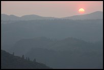 Setting sun and mountain ridges, Stanislaus National Forest. California, USA ( color)