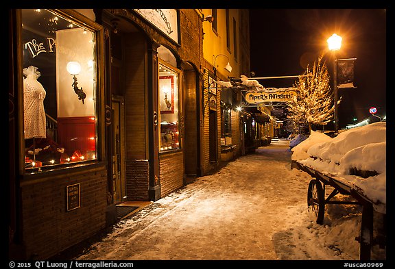 Snowy sidewalk at night, Truckee. California, USA (color)