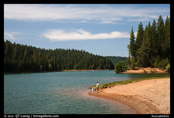 Family on shore of Jenkinson Lake, Pollock Pines. California, USA (color)