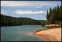 Family on shore of Jenkinson Lake, Pollock Pines. California, USA ( color)