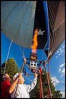 Pilot releases hot air into balloon, Tahoe National Forest. California, USA ( color)