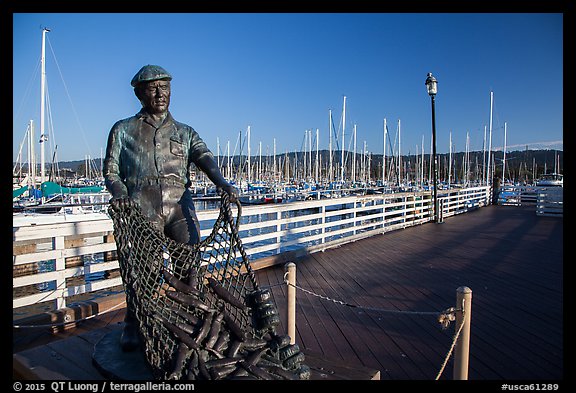 Statue of fisherman on wharf. Monterey, California, USA (color)
