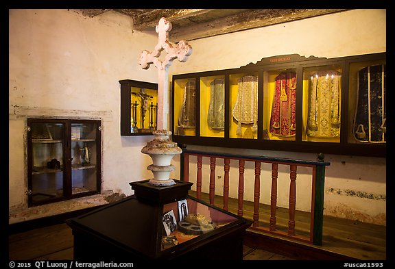Room with cross and ceremonial dress, Mission San Juan. San Juan Bautista, California, USA (color)