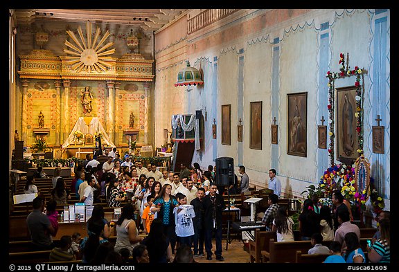 Church with festival in progress, Mission San Miguel. California, USA (color)