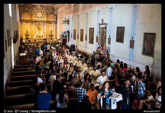 Festival procession in Mission San Miguel church. California, USA (color)